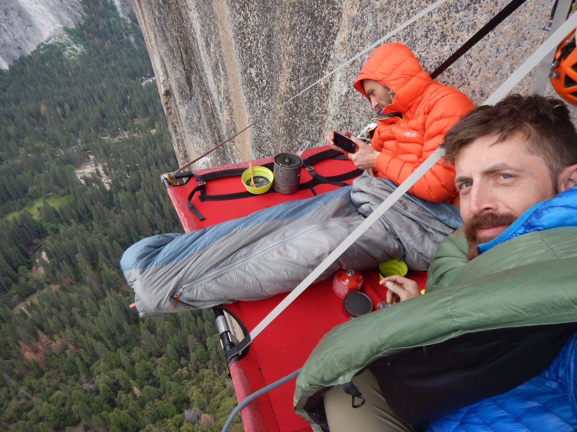 Climbers resting on a portaledge high on El Capitan